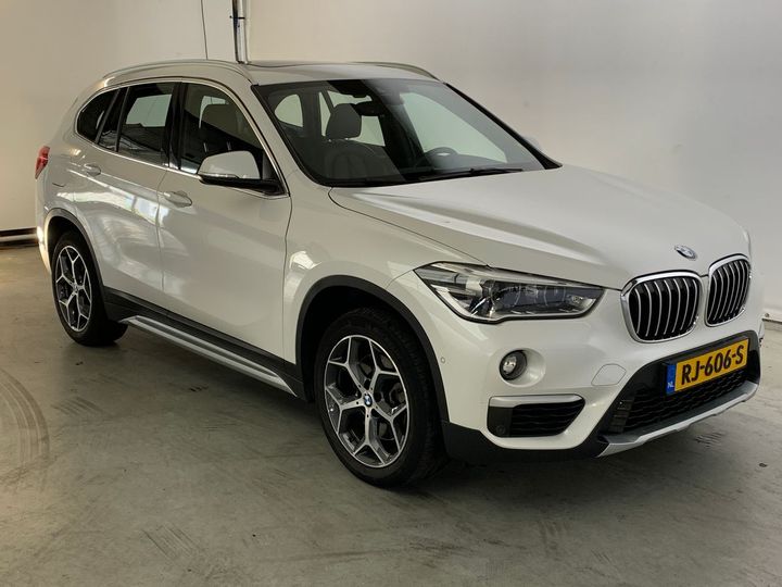 Photo 4 VIN: WBAHS910803D23954 - BMW X1 