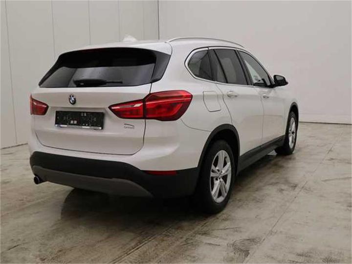 Photo 10 VIN: WBAHT510005J68579 - BMW X1 