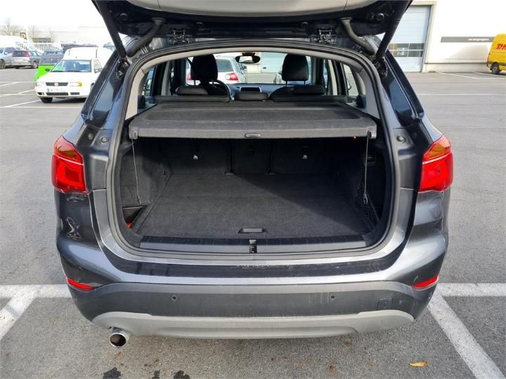 Photo 10 VIN: WBAHT510005J69909 - BMW X1 SUV 