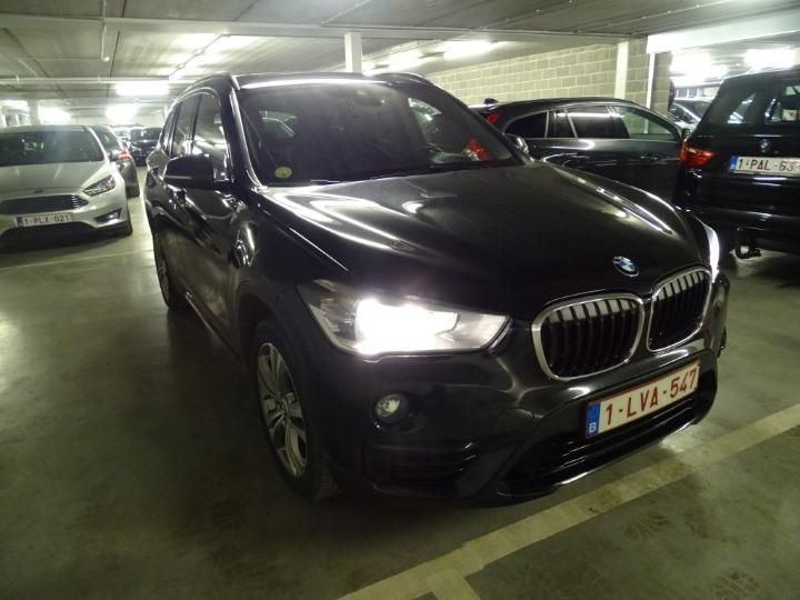 Photo 2 VIN: WBAHU510X0P849771 - BMW X1 SUV 