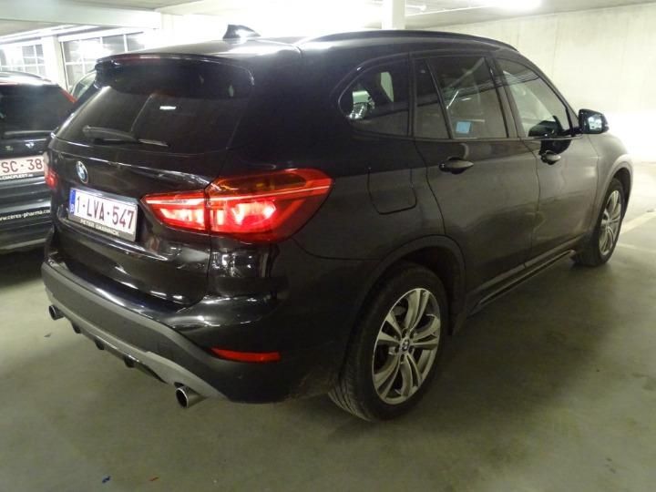 Photo 4 VIN: WBAHU510X0P849771 - BMW X1 SUV 