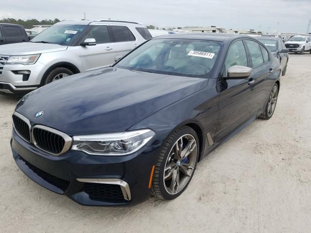 Photo 1 VIN: WBAJB9C54JB036464 - BMW M550XI 