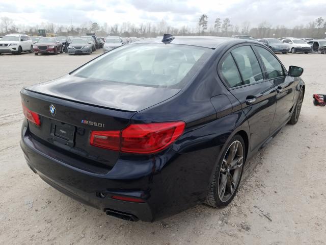 Photo 3 VIN: WBAJB9C54JB036464 - BMW M550XI 