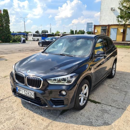 Photo 1 VIN: WBAJG110103G82390 - BMW X1 SUV 