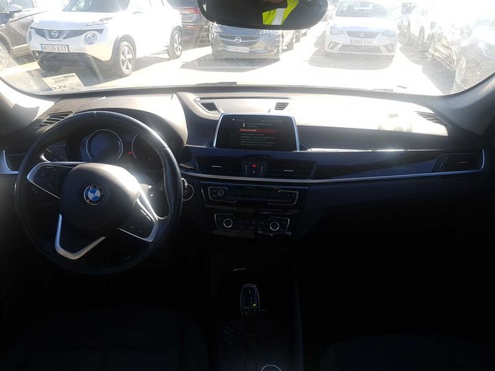 Photo 7 VIN: WBAJG11010ER70007 - BMW X1 