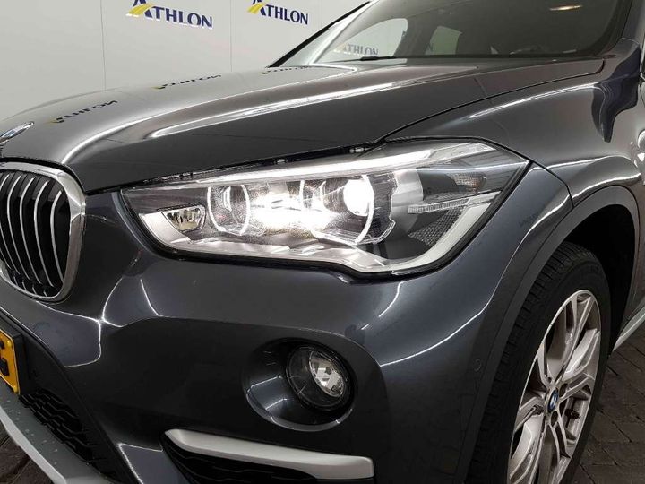 Photo 12 VIN: WBAJG11040ED50450 - BMW X1 