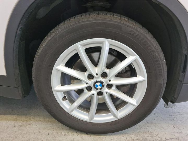 Photo 13 VIN: WBAJG11040ED98238 - BMW X1 