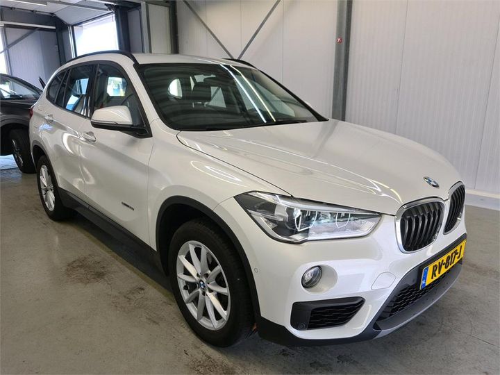 Photo 2 VIN: WBAJG11040ED98238 - BMW X1 