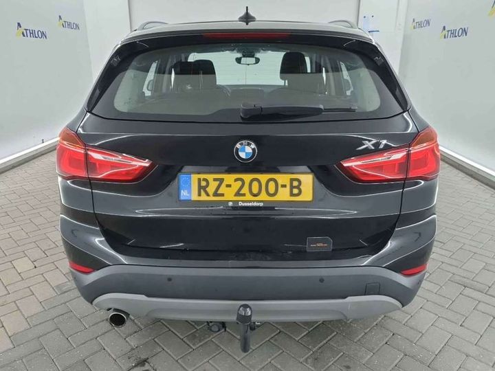 Photo 17 VIN: WBAJG11050ED98698 - BMW X1 