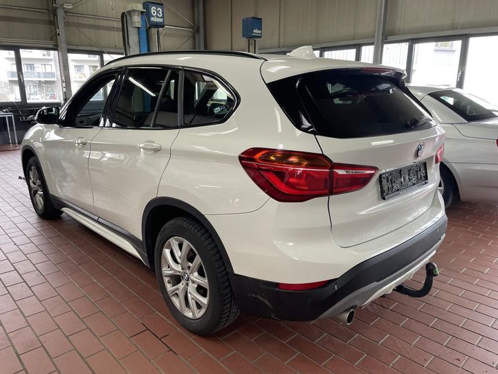 Photo 11 VIN: WBAJG110703G85567 - BMW X1 