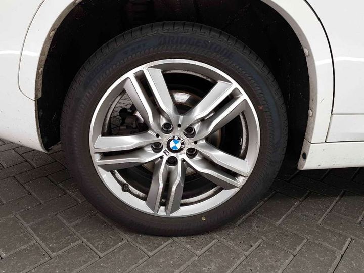 Photo 10 VIN: WBAJG31010EE22734 - BMW X1 