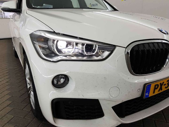 Photo 13 VIN: WBAJG31010EE22734 - BMW X1 