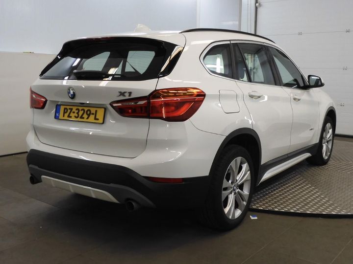 Photo 2 VIN: WBAJG31010EE22930 - BMW X1 