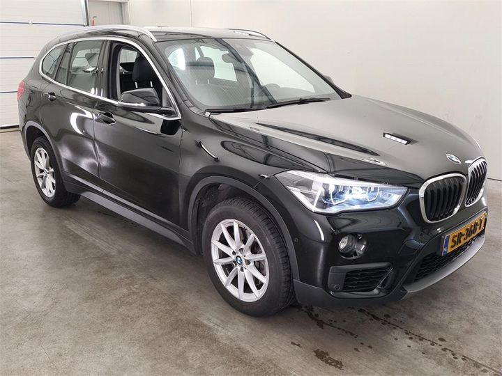 Photo 11 VIN: WBAJG31010EE29716 - BMW X1 