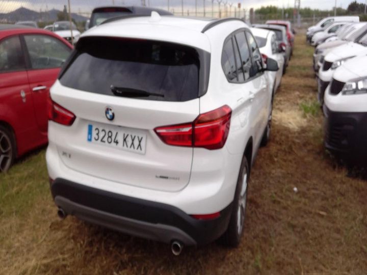 Photo 2 VIN: WBAJG310503H27942 - BMW X1 