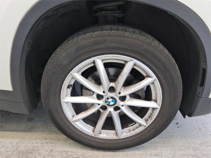 Photo 11 VIN: WBAJH11000EN47173 - BMW X1 