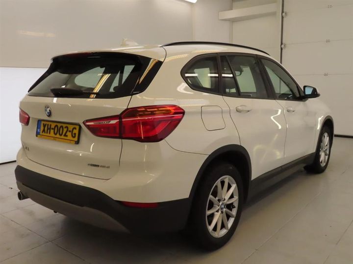 Photo 1 VIN: WBAJH11010EN48719 - BMW X1 