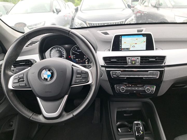 Photo 4 VIN: WBAJH11010ES47674 - BMW X1 