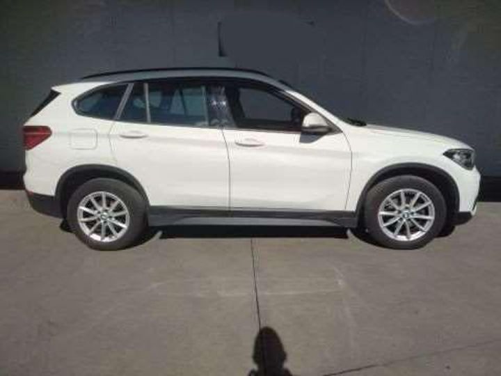 Photo 2 VIN: WBAJH11030EN47958 - BMW X1 