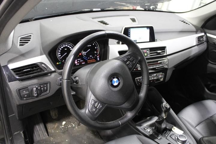 Photo 11 VIN: WBAJH110403G14582 - BMW X1 SUV 