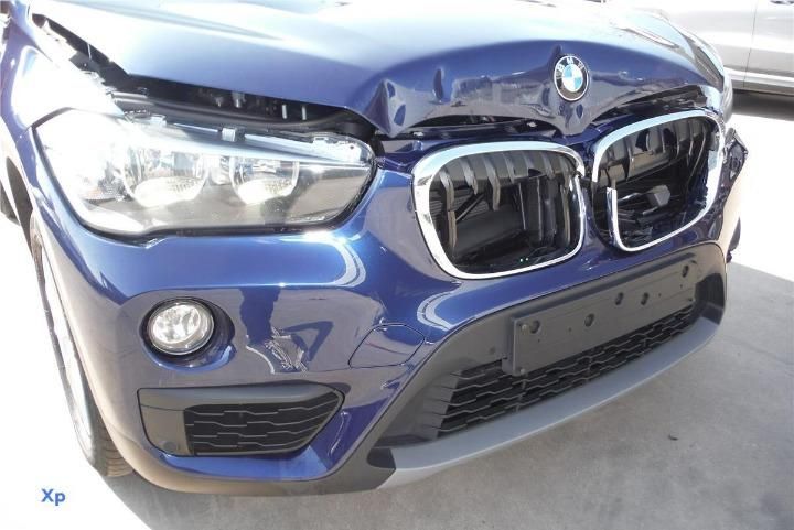 Photo 10 VIN: WBAJH11070EN48871 - BMW X1 SUV 