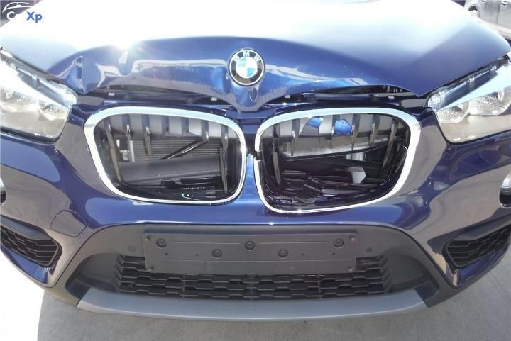 Photo 11 VIN: WBAJH11070EN48871 - BMW X1 SUV 