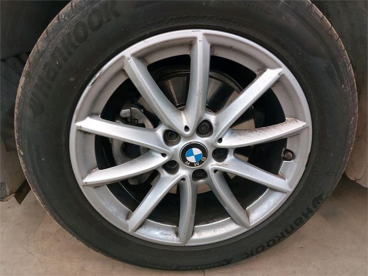 Photo 12 VIN: WBAJH11070ES47999 - BMW X1 