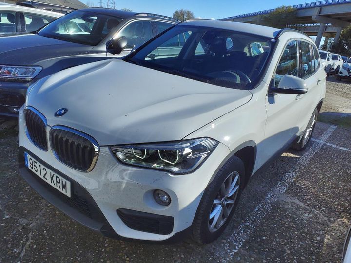 Photo 22 VIN: WBAJH51000EK94329 - BMW X1 