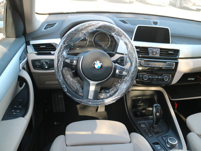 Photo 9 VIN: WBAJH510103J19714 - BMW X1 