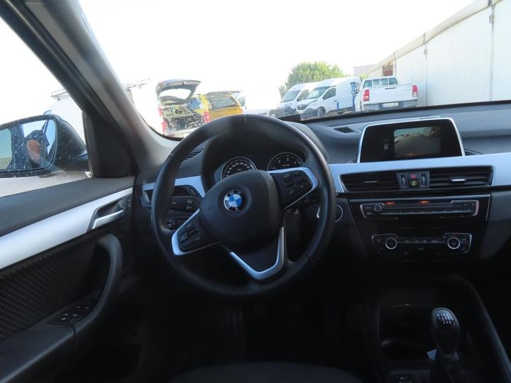 Photo 6 VIN: WBAJH51040EC80422 - BMW X1 