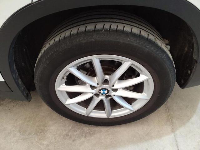 Photo 11 VIN: WBAJH51040EK97377 - BMW X1 