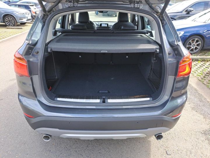 Photo 6 VIN: WBAJH510503J75297 - BMW X1 