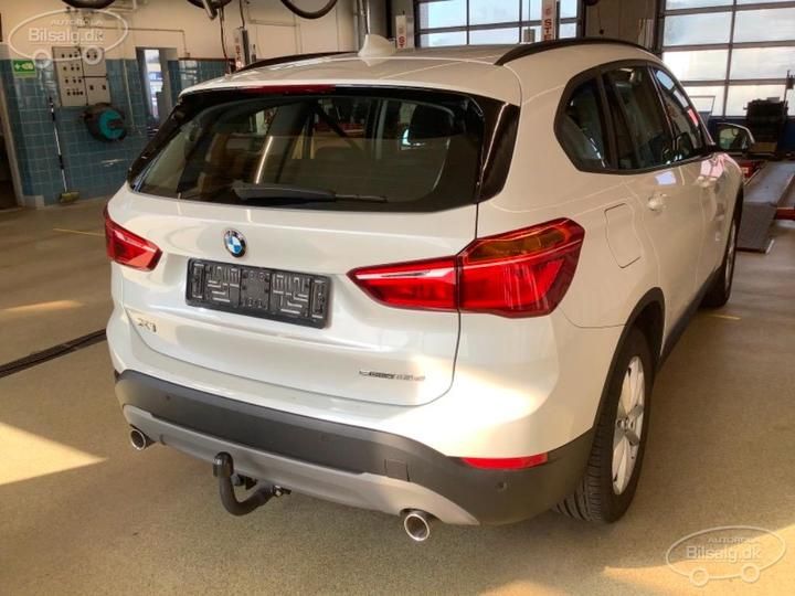 Photo 19 VIN: WBAJH5105K3J19069 - BMW X1 SUV 