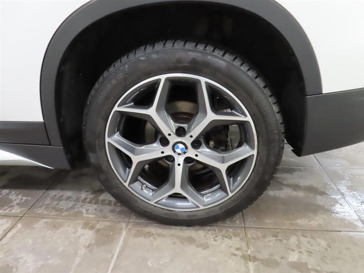 Photo 8 VIN: WBAJH51060EK96991 - BMW X1 