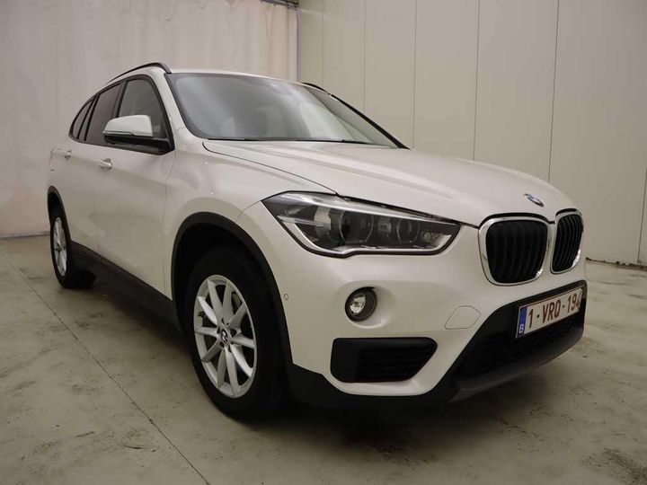 Photo 9 VIN: WBAJH51060EM85639 - BMW X1 