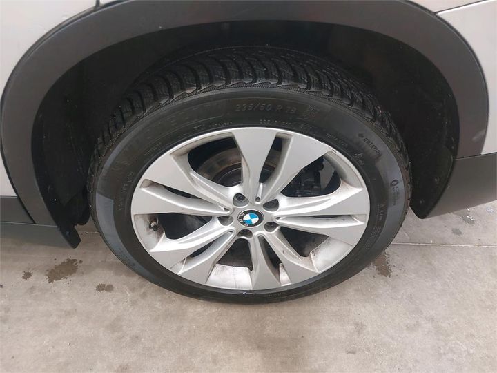 Photo 9 VIN: WBAJH71000EM55029 - BMW X1 