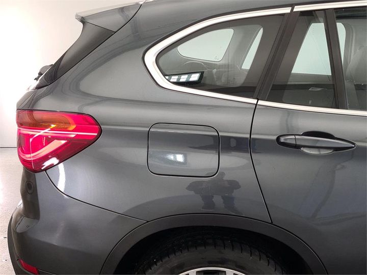 Photo 11 VIN: WBAJH91000EB07990 - BMW X1 