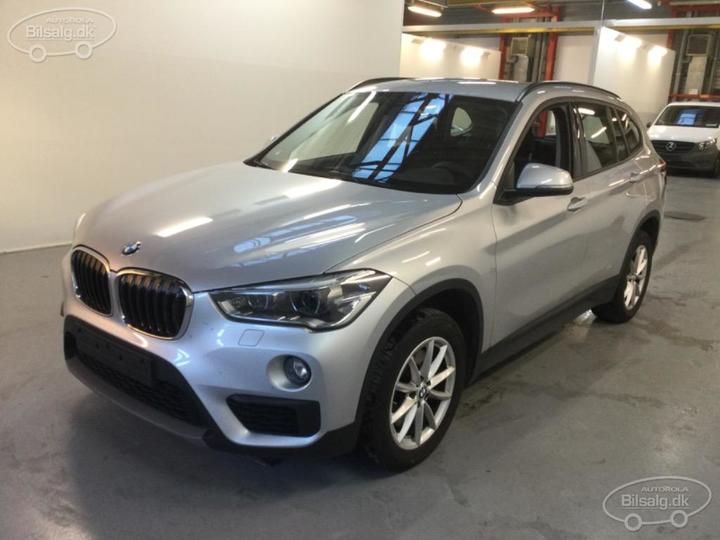 Photo 1 VIN: WBAJH9101KEJ54557 - BMW X1 SUV 