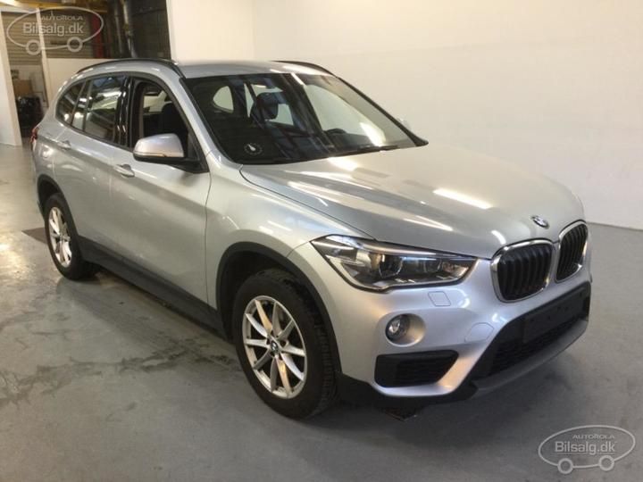 Photo 12 VIN: WBAJH9101KEJ54557 - BMW X1 SUV 