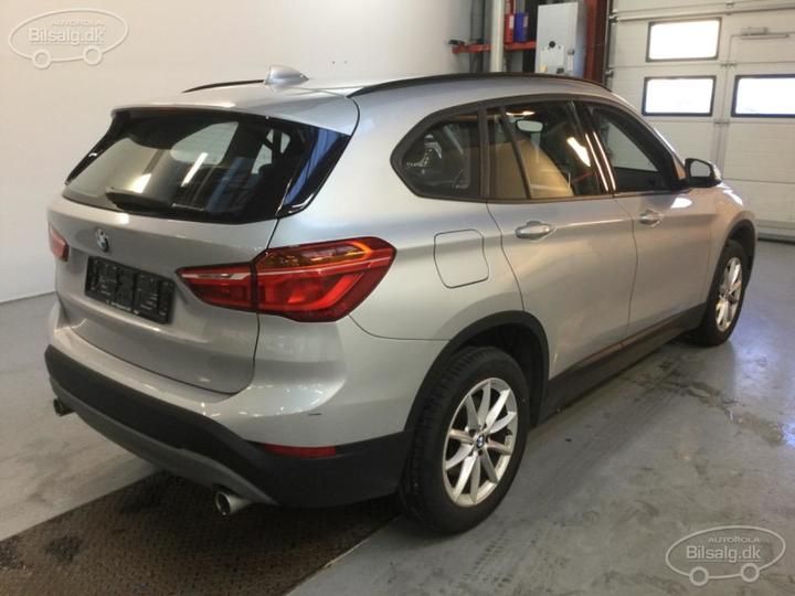 Photo 16 VIN: WBAJH9101KEJ54557 - BMW X1 SUV 