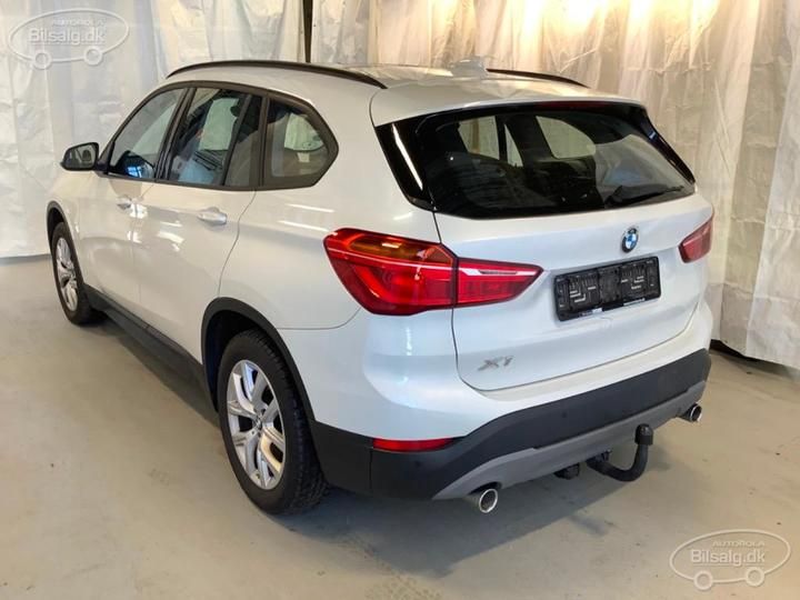 Photo 21 VIN: WBAJH9103KEJ54897 - BMW X1 SUV 