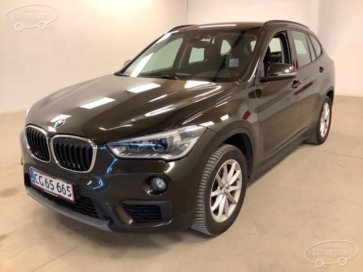 Photo 1 VIN: WBAJJ1100KEF68227 - BMW X1 SUV 