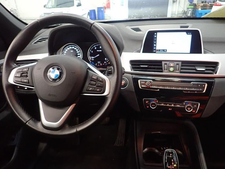 Photo 5 VIN: WBAJJ11060EF65703 - BMW X1 