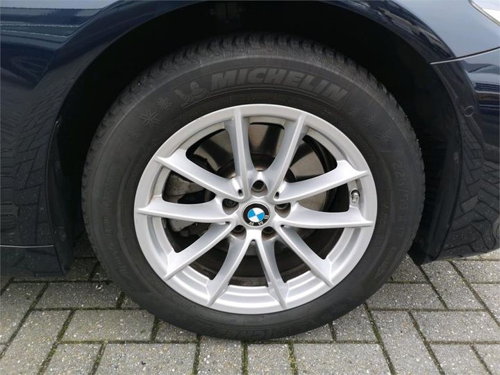 Photo 12 VIN: WBAJT11010CD00502 - BMW 5-SERIE 