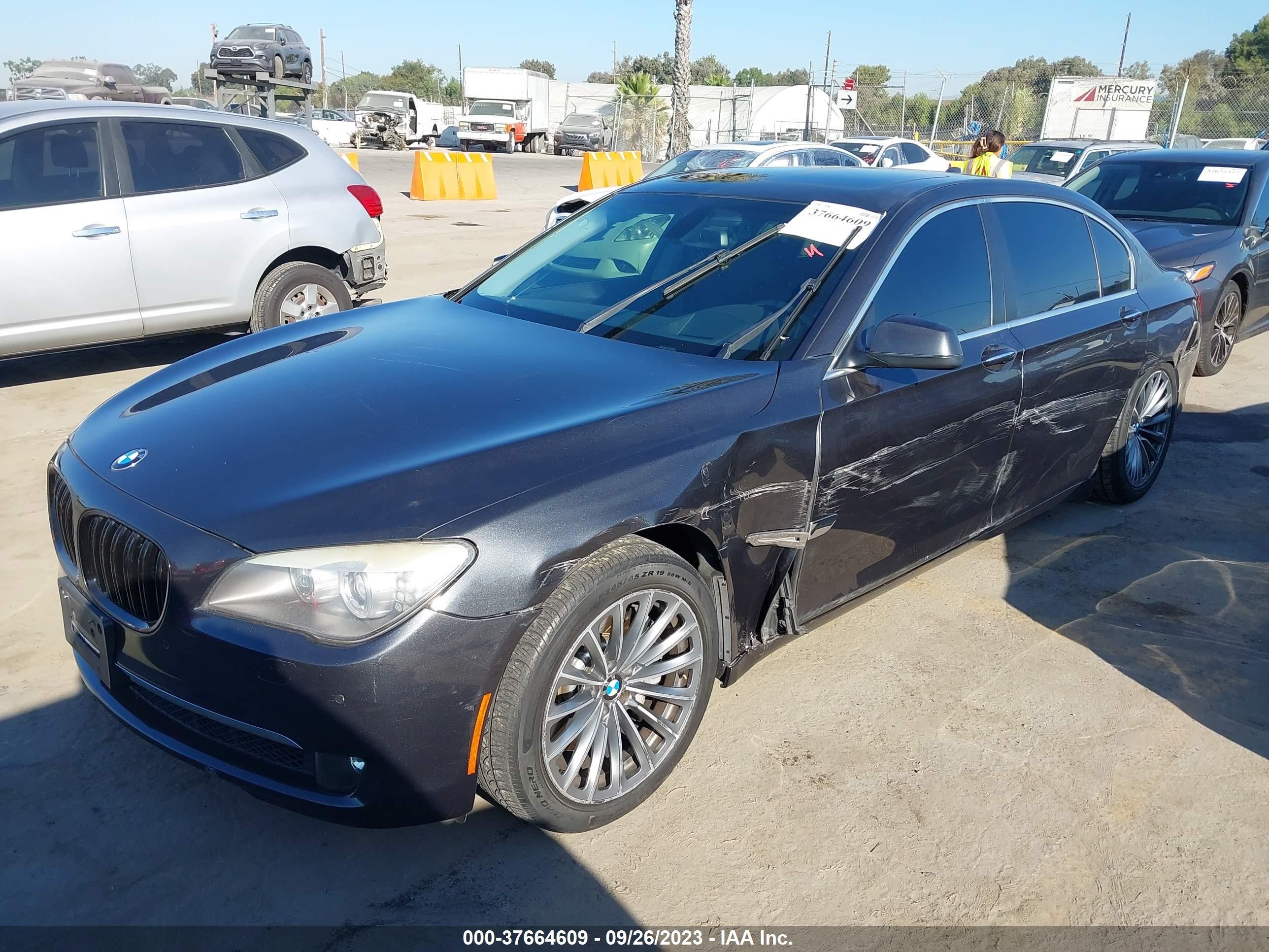 Photo 1 VIN: WBAKB8C54BCY65819 - BMW 7ER 