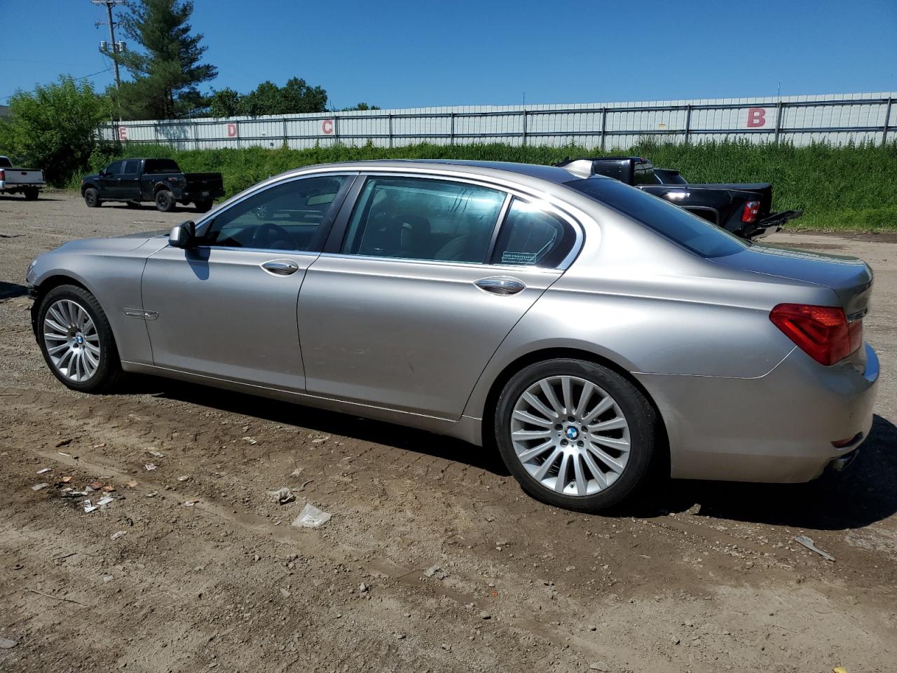 Photo 1 VIN: WBAKC8C58CC436424 - BMW 7ER 