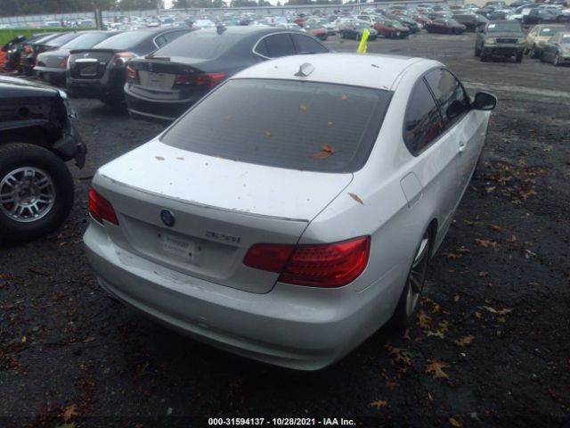 Photo 3 VIN: WBAKE3C56BE558523 - BMW 3 