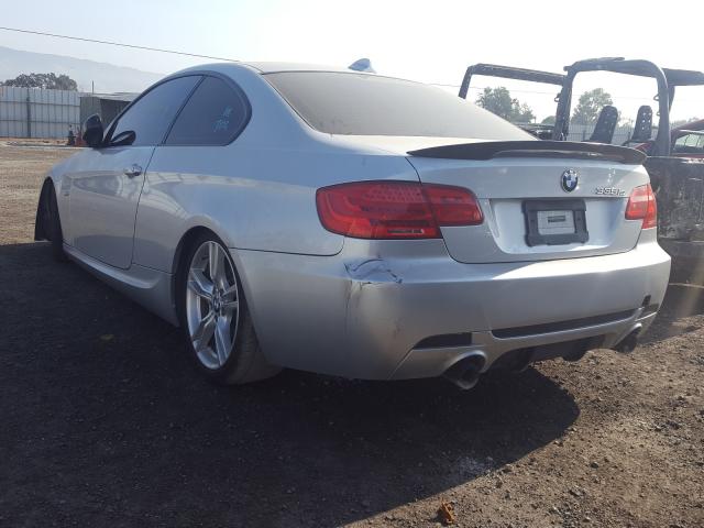 Photo 2 VIN: WBAKG1C5XBE618320 - BMW 335 IS 