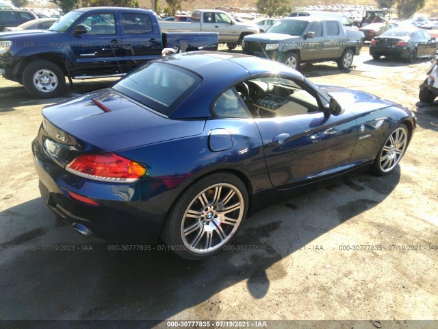 Photo 3 VIN: WBALM1C5XBE393619 - BMW Z4 