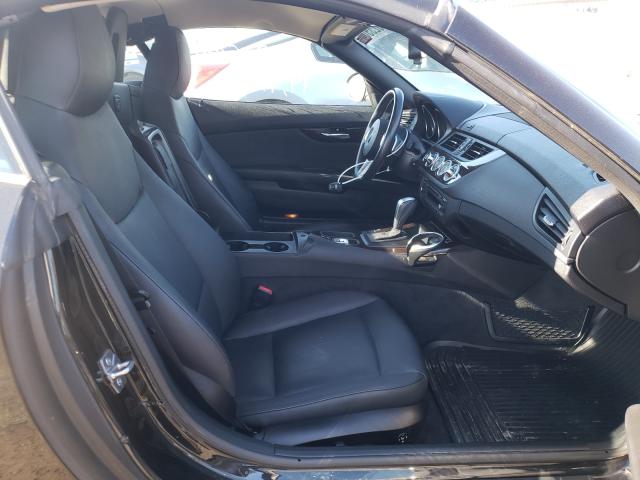 Photo 4 VIN: WBALM5C5XBE380067 - BMW Z4 